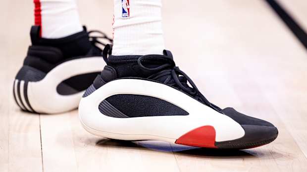 Houston Rockets forward Jabari Smith Jr.'s white and black adidas sneakers.
